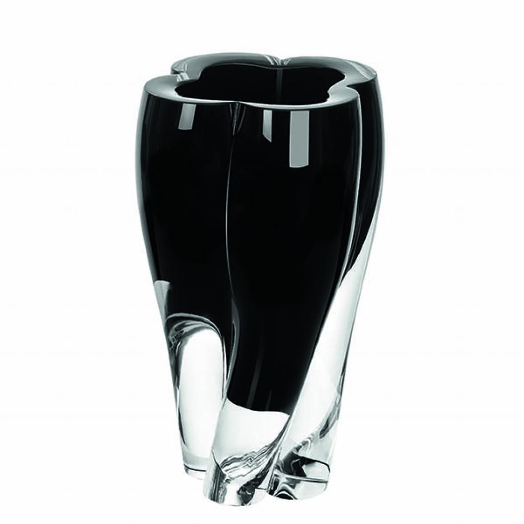 <strong>Signature</strong><br />Réminiscence du célèbre monogramme, vase en verre de Murano massif, translucide ou noir, réalisé à la main.  H 30 x Ø 16 cm. Modèle Blossom Vase, création Tokujin Yoshioka, collection Objets Nomades Louis Vuitton, 3 000 € (<a href="http://louisvuitton.com" target="_blank">louisvuitton.com</a>)