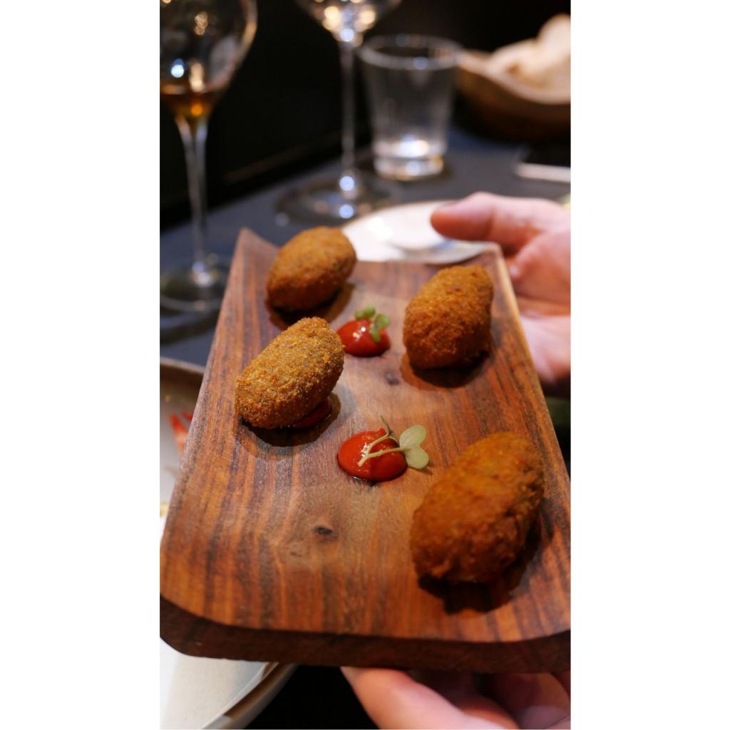 Beef cheek croquetas served with a kind of pepper ketchup