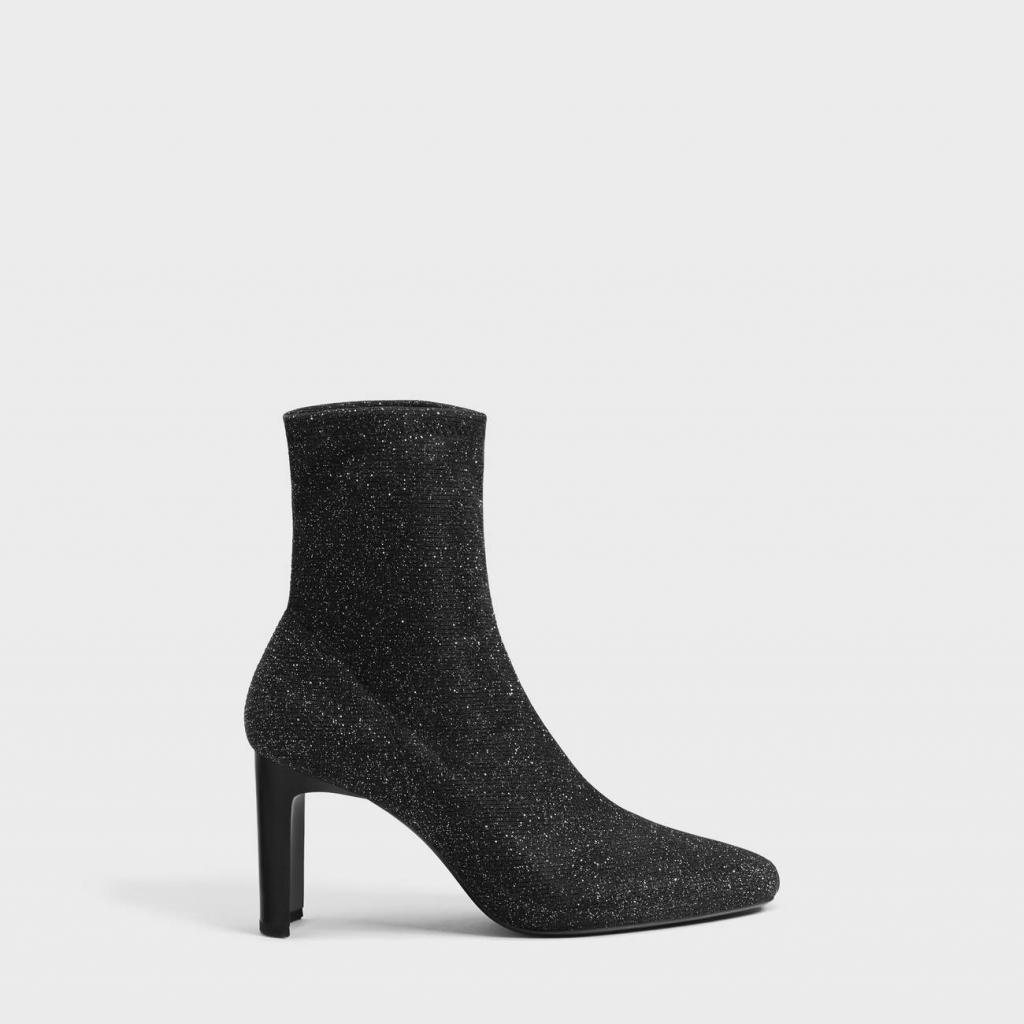 Disponible <a href="https://www.bershka.com/be/femme/collection/party-collection/bottines-%C3%A0-talon-chaussures-chaussettes-scintillantes-c1010401003p102223141.html?colorId=040" target="_blank">ici</a>