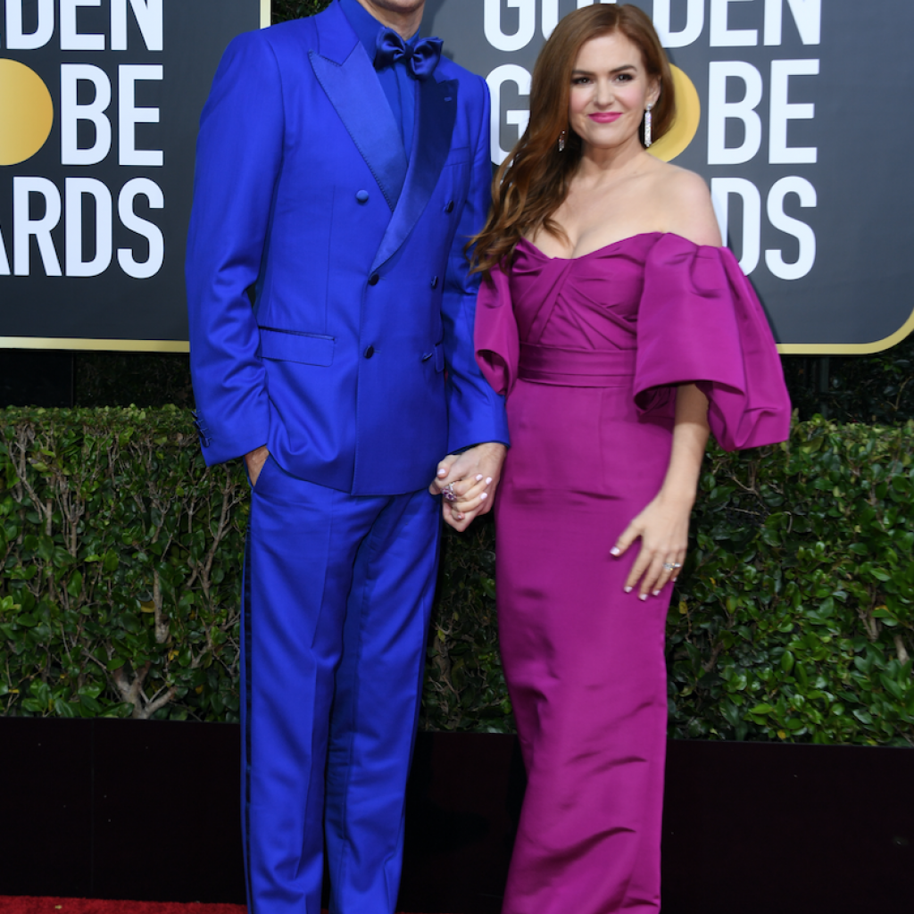 L’acteur et humoriste Sacha Baron Cohen avait opté pour un costume bleu électrique Dolce &amp; Gabbana et des chaussures Christian Louboutin. Quant à sa femme, Isla Fisher, elle affichait une robe violette. 