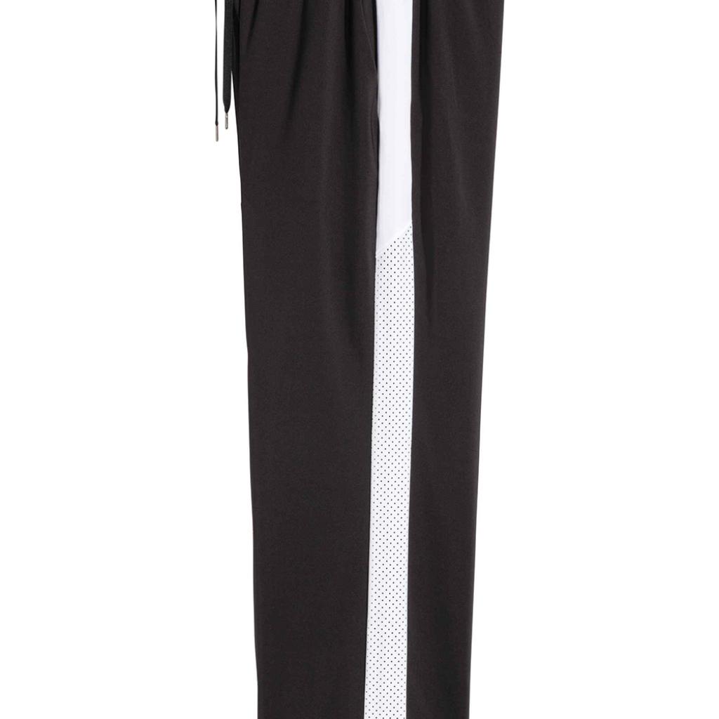 Pantalon à bandes blanches microperforées H&amp;M, 29,99 €