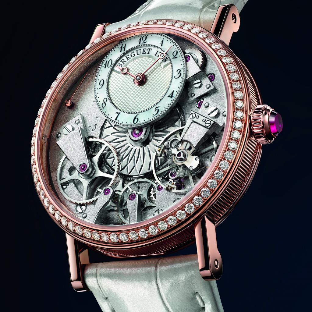 Montre Breguet Tradition Dame - boîtier or rose - couronne sertie - cadran nacre - mouvement automatique.